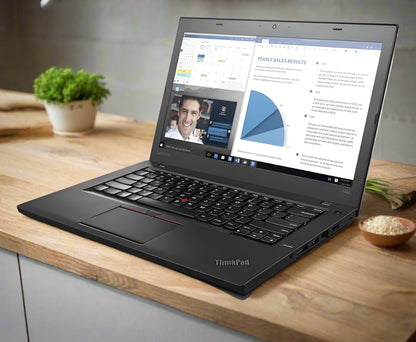 Laptop with ThinkPad branding on a white background